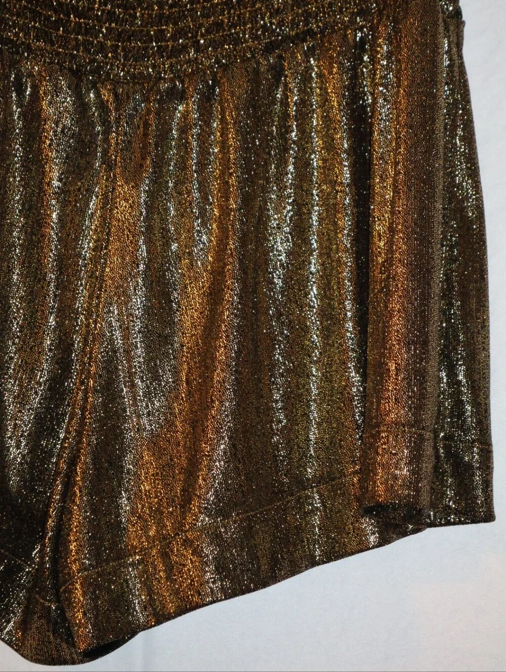 Pants Store High-Waist Shimmery Metallic Gold Fly Away Swing Shorts.